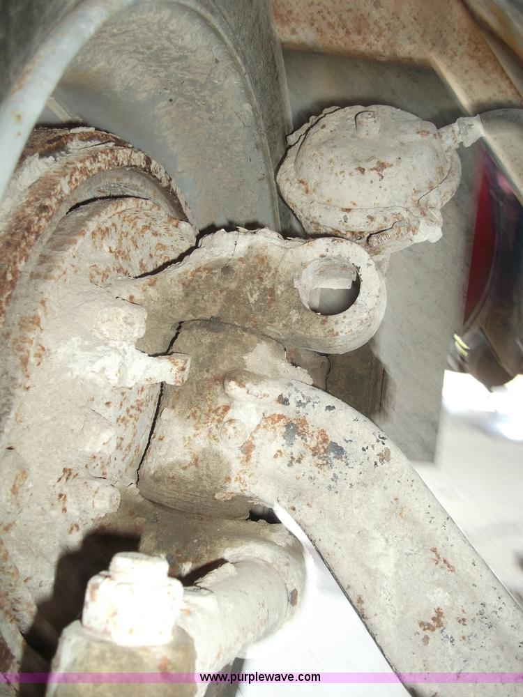 image for item B5072 1987 Mack DM600 triple axle mixer truck