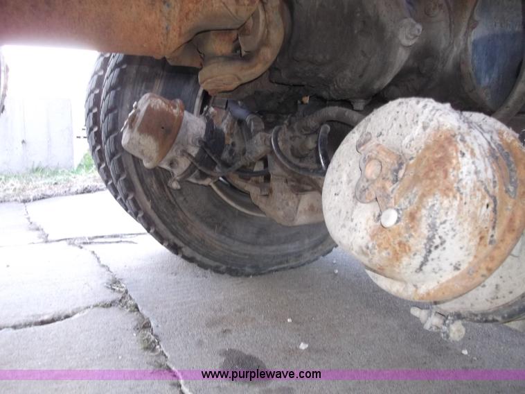 image for item B5072 1987 Mack DM600 triple axle mixer truck