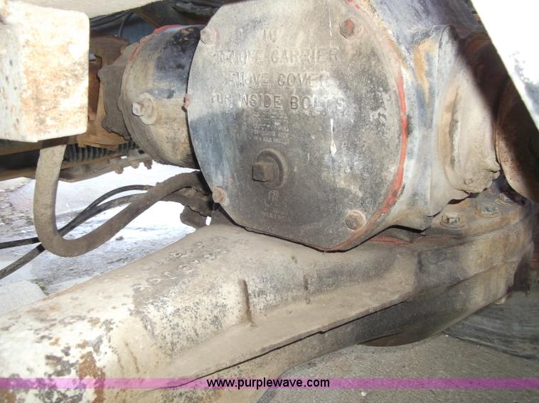 image for item B5072 1987 Mack DM600 triple axle mixer truck