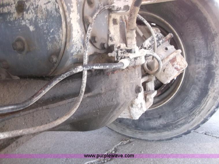 image for item B5072 1987 Mack DM600 triple axle mixer truck