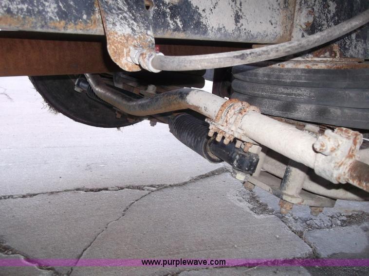 image for item B5072 1987 Mack DM600 triple axle mixer truck