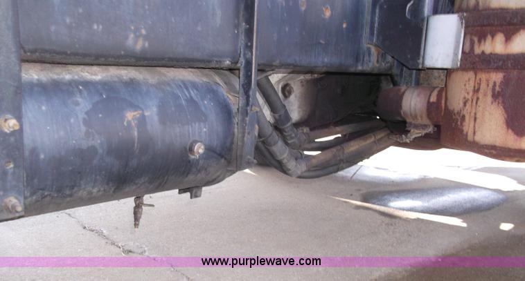 image for item B5072 1987 Mack DM600 triple axle mixer truck