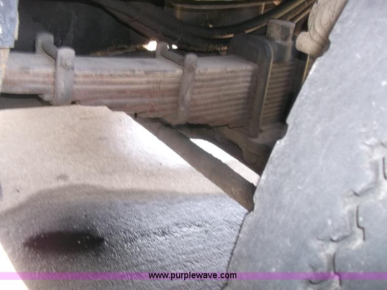 image for item B5072 1987 Mack DM600 triple axle mixer truck