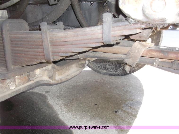 image for item B5072 1987 Mack DM600 triple axle mixer truck