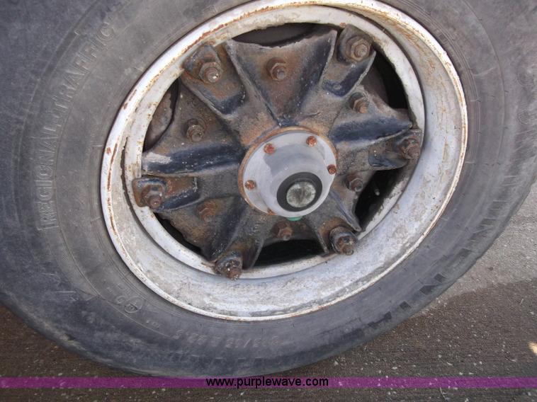 image for item B5072 1987 Mack DM600 triple axle mixer truck