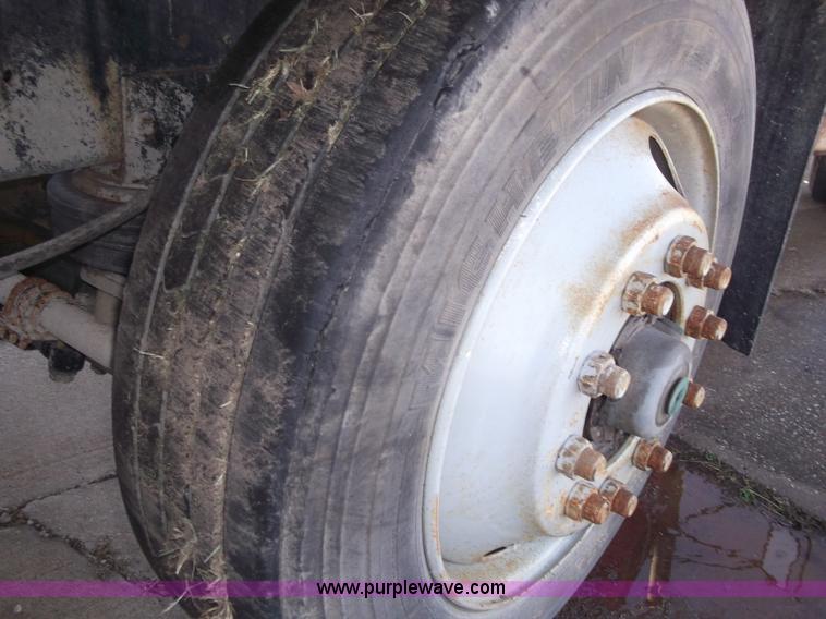 image for item B5072 1987 Mack DM600 triple axle mixer truck