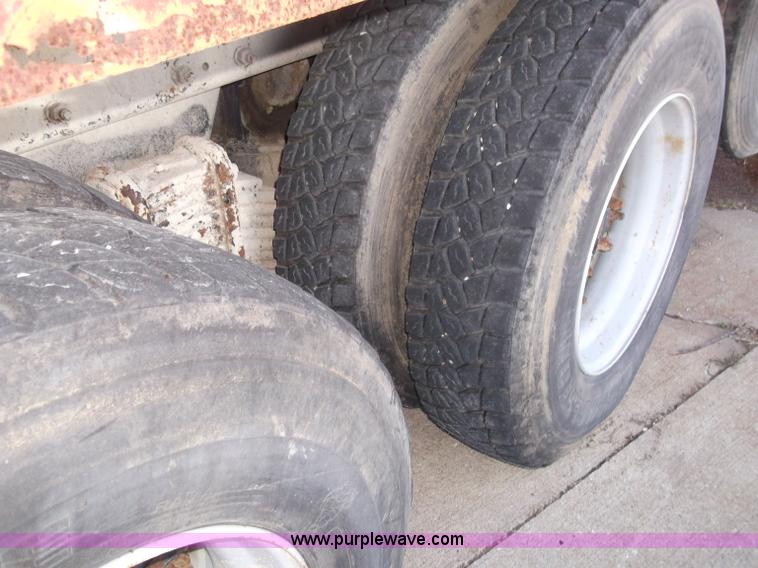 image for item B5072 1987 Mack DM600 triple axle mixer truck