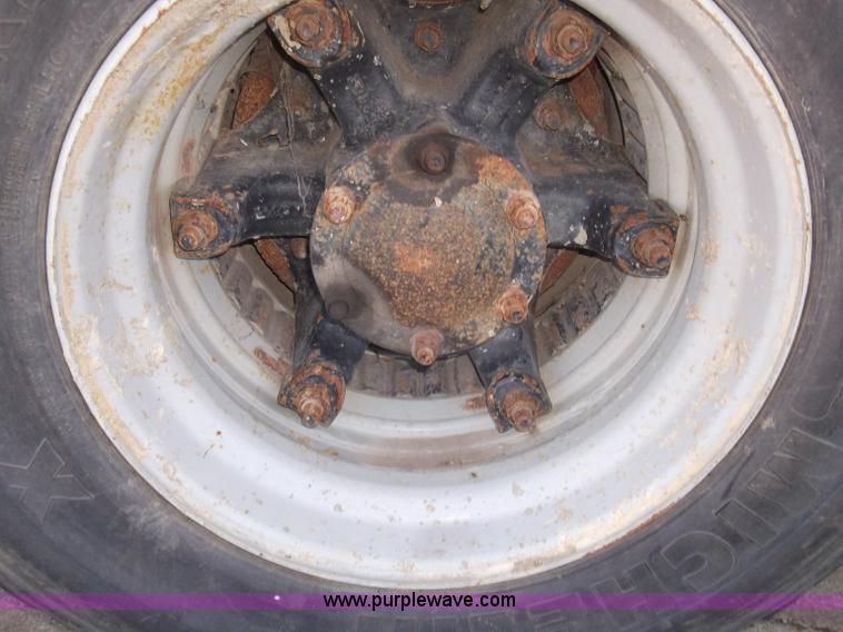 image for item B5072 1987 Mack DM600 triple axle mixer truck