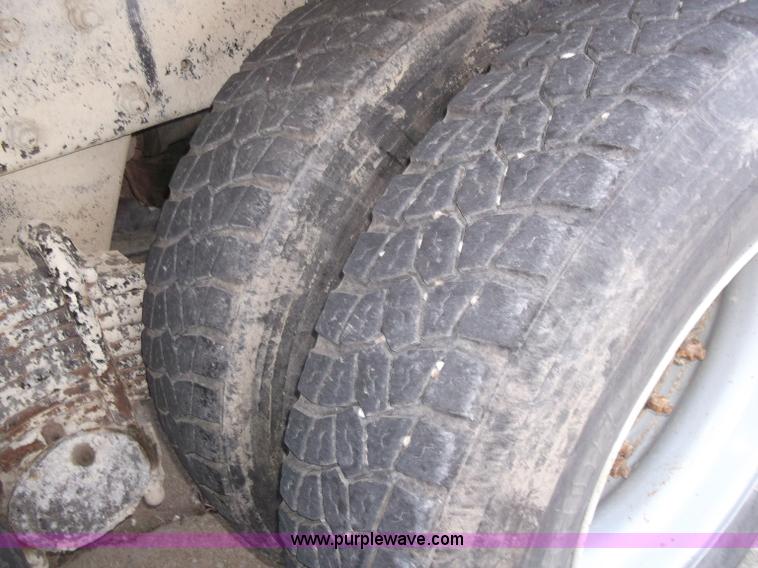 image for item B5072 1987 Mack DM600 triple axle mixer truck