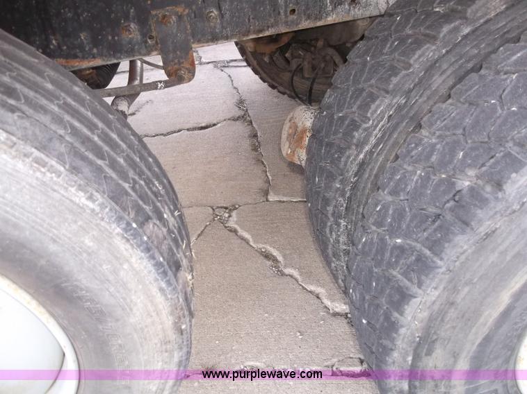 image for item B5072 1987 Mack DM600 triple axle mixer truck