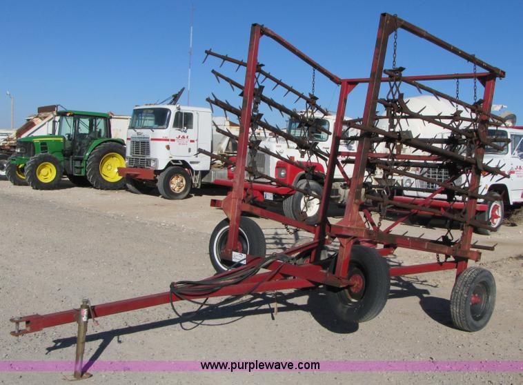 image for item B2124 21' folding tine harrow