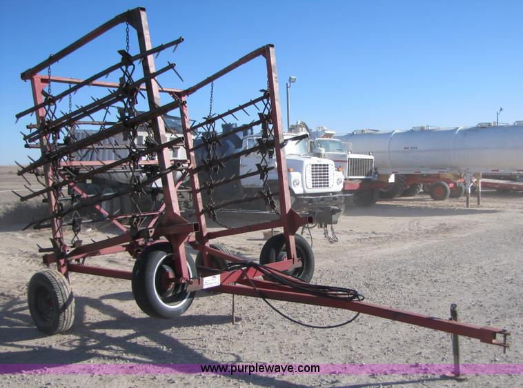 image for item B2124 21' folding tine harrow