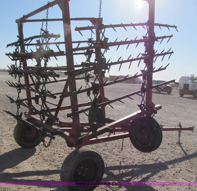 image for item B2124 21' folding tine harrow