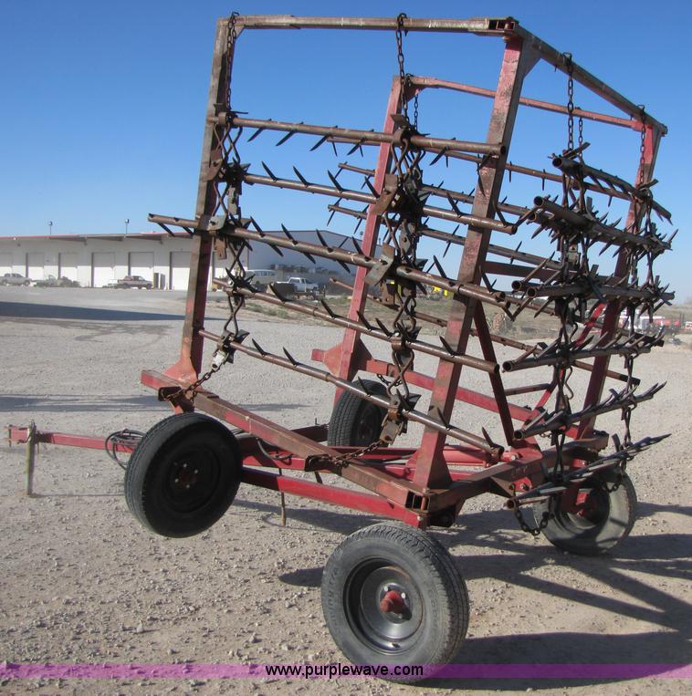 image for item B2124 21' folding tine harrow