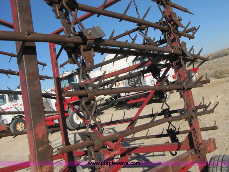 image for item B2124 21' folding tine harrow