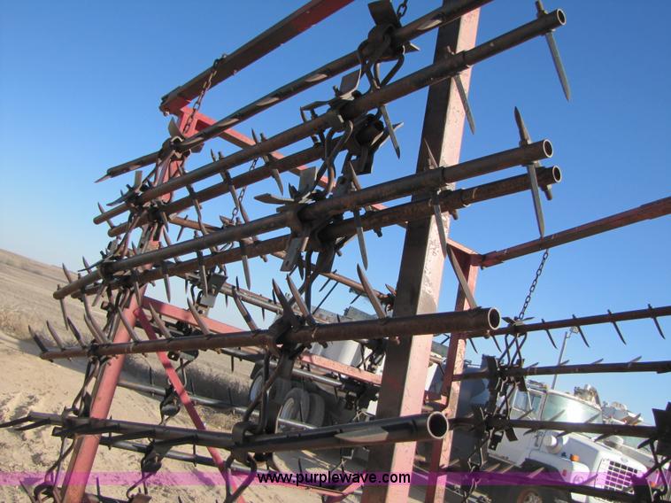 image for item B2124 21' folding tine harrow