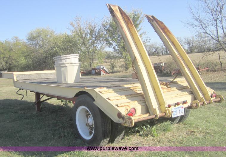 image for item C5115 1974 24' flatbed semi trailer