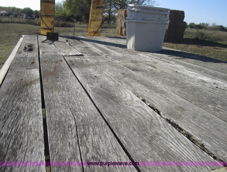 image for item C5115 1974 24' flatbed semi trailer