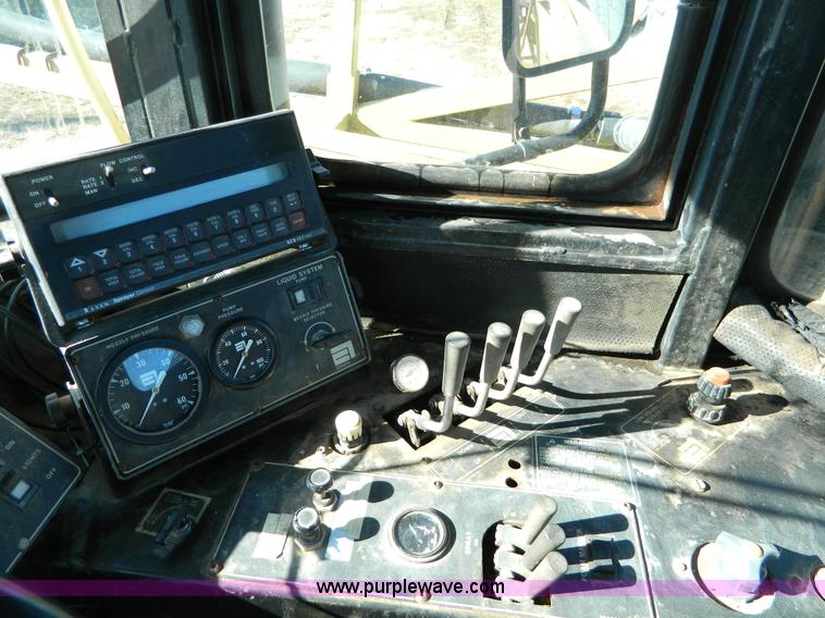 image for item D8613 1991 Ag-Chem TerraGator 1664T self propelled sprayer