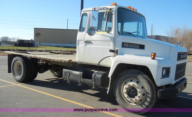 image for item A3353 1989 Mack CS250P flatbed truck
