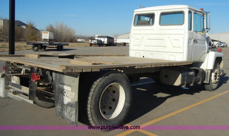 image for item A3353 1989 Mack CS250P flatbed truck