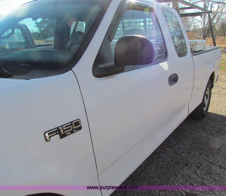 image for item B7034 1997 Ford F150 XL super cab pickup truck