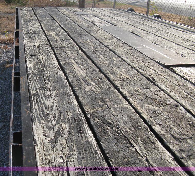 image for item A4483 1982 LCT 20' gooseneck flatbed trailer