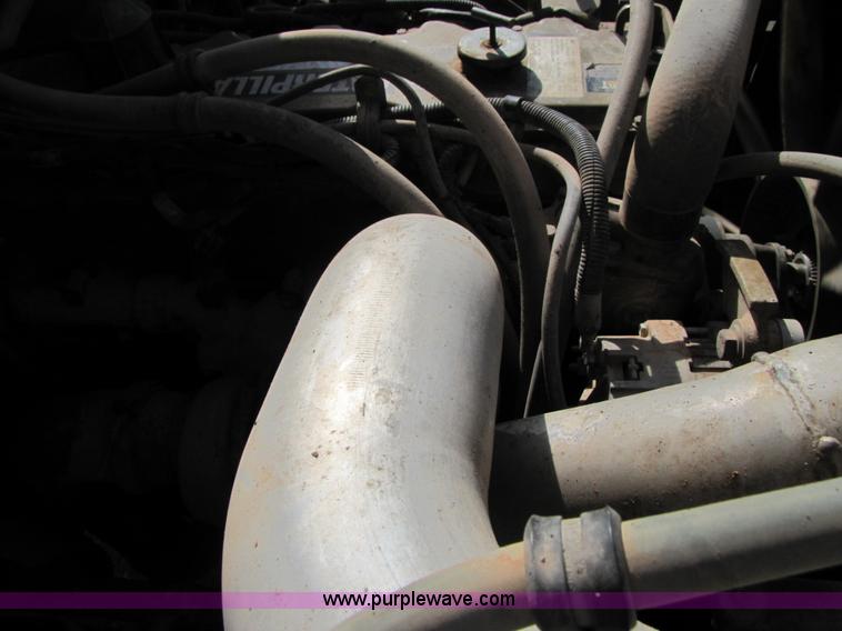 image for item B2129 2000 Freightliner FL70 semi truck