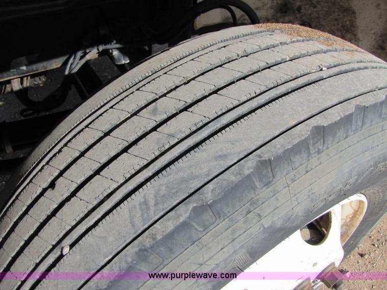 image for item B2129 2000 Freightliner FL70 semi truck