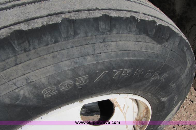 image for item B2129 2000 Freightliner FL70 semi truck