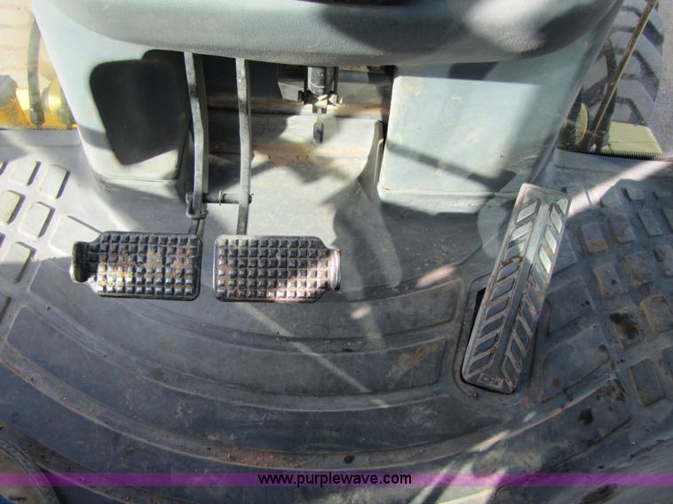 image for item B2133 2003 New Holland LB110 backhoe