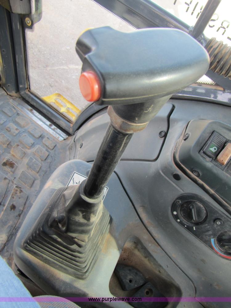 image for item B2133 2003 New Holland LB110 backhoe