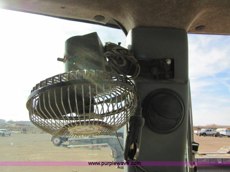 image for item B2133 2003 New Holland LB110 backhoe