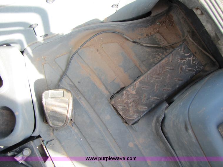 image for item B2133 2003 New Holland LB110 backhoe