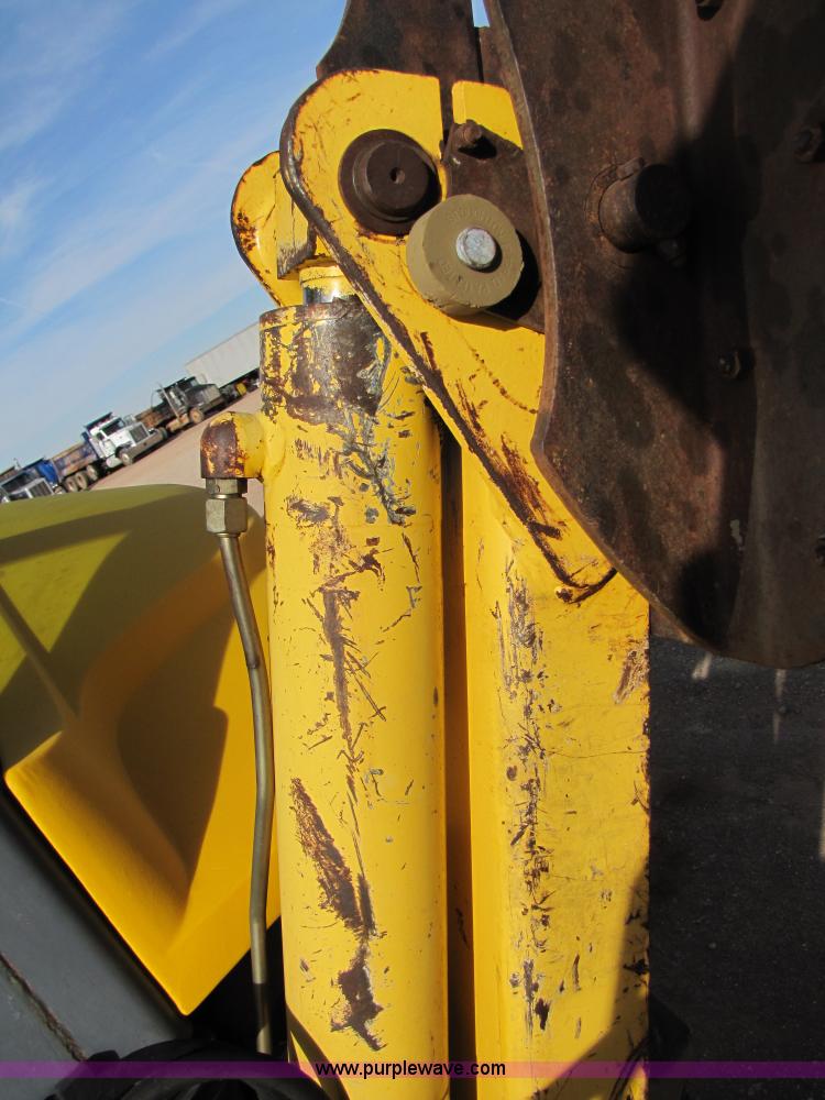 image for item B2133 2003 New Holland LB110 backhoe