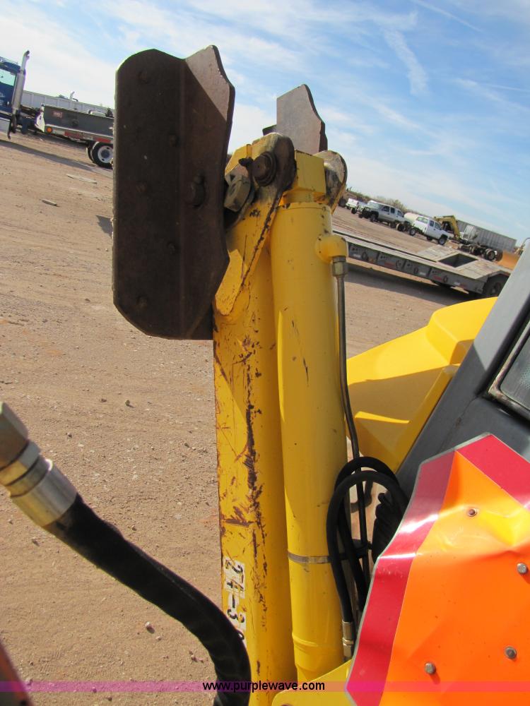 image for item B2133 2003 New Holland LB110 backhoe