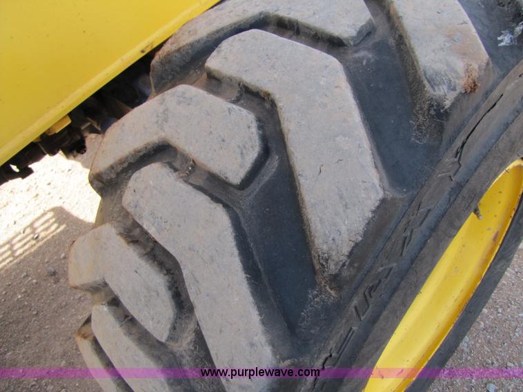 image for item B2133 2003 New Holland LB110 backhoe
