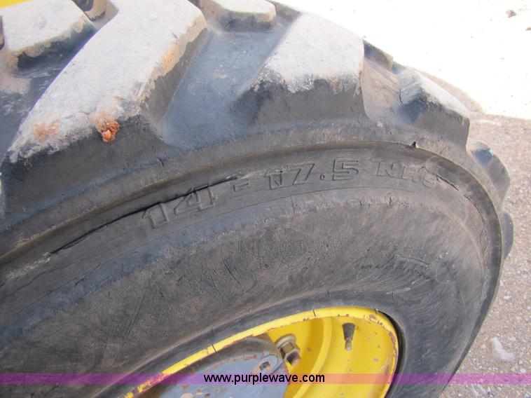 image for item B2133 2003 New Holland LB110 backhoe