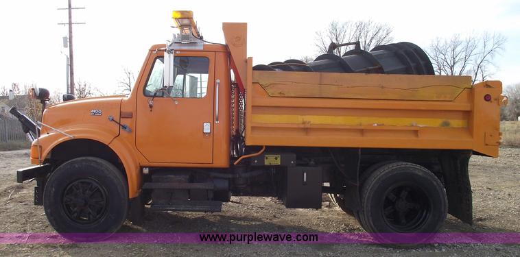 image for item C5819 2000 International 4900 dump truck with plow and spreader
