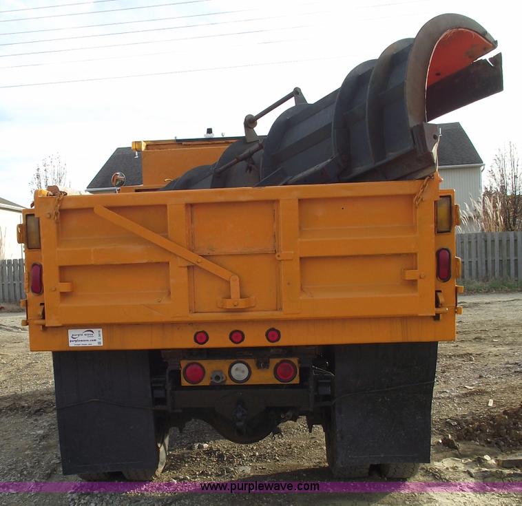 image for item C5819 2000 International 4900 dump truck with plow and spreader