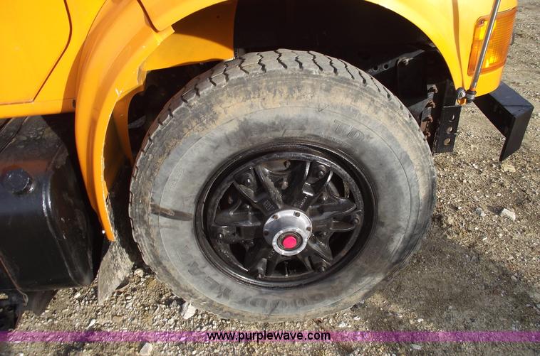 image for item C5819 2000 International 4900 dump truck with plow and spreader