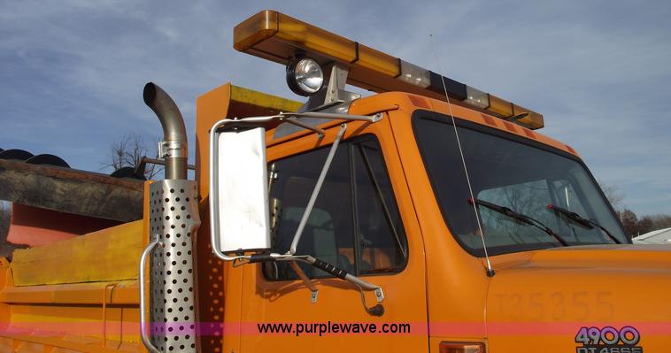 image for item C5819 2000 International 4900 dump truck with plow and spreader