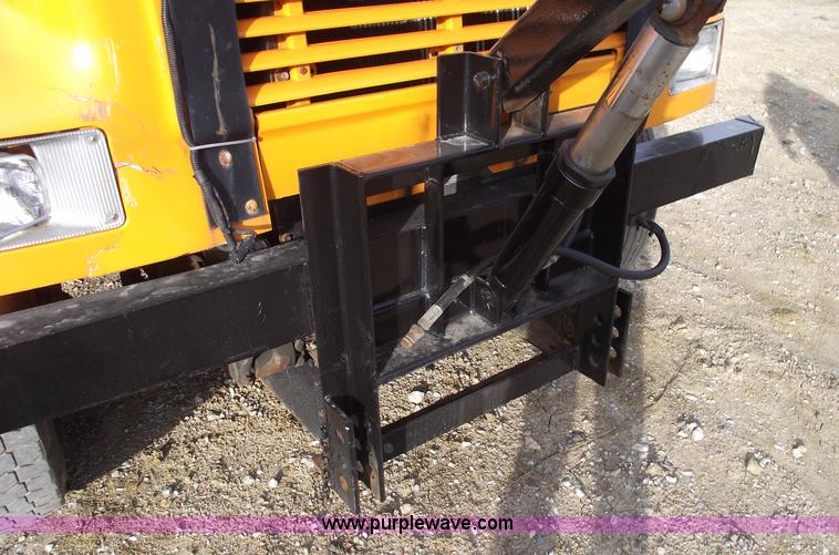 image for item C5819 2000 International 4900 dump truck with plow and spreader