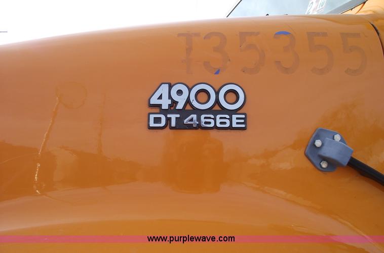 image for item C5819 2000 International 4900 dump truck with plow and spreader