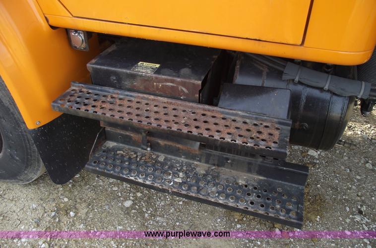 image for item C5819 2000 International 4900 dump truck with plow and spreader