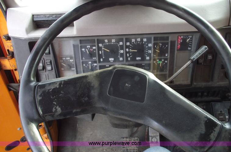 image for item C5819 2000 International 4900 dump truck with plow and spreader