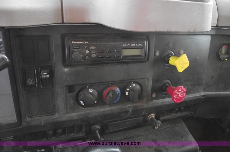 image for item C5819 2000 International 4900 dump truck with plow and spreader