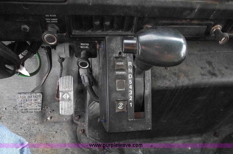 image for item C5819 2000 International 4900 dump truck with plow and spreader