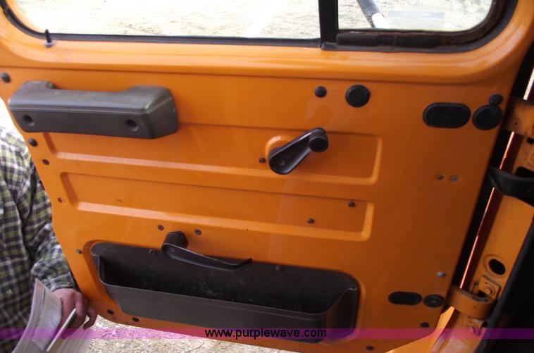 image for item C5819 2000 International 4900 dump truck with plow and spreader