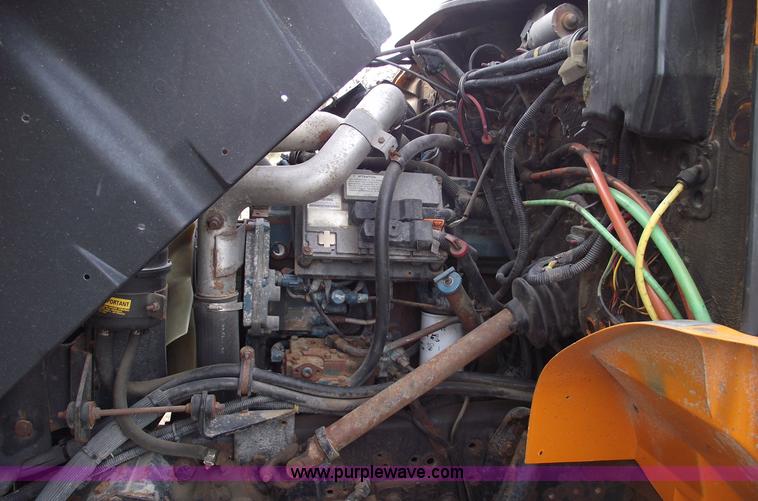 image for item C5819 2000 International 4900 dump truck with plow and spreader